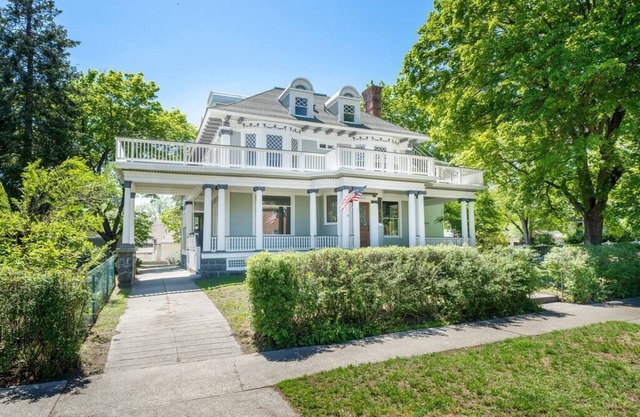 Historic Family Home with 8 BDRMS, 9 BATHS & 3 Kitchens!