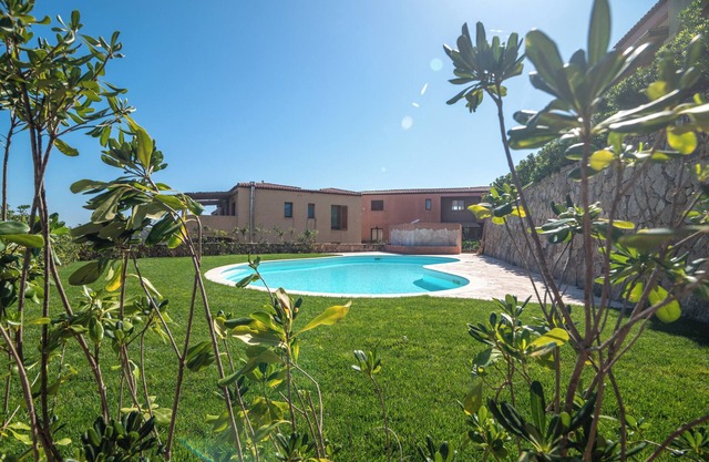 Appartement de vacances "Stella Maris" avec vue sur la mer, piscine partagée et terrasse privée
