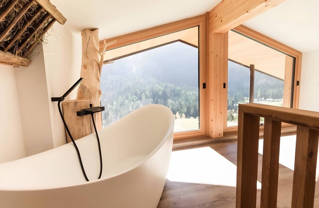 Appartement "Chalet-Suite Panorama" avec vue sur les montagnes, terrasse privée et Wi-Fi