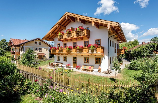 Appartement de vacances "Beim Paulfischer - Eckbankerl" près de Chiemsee avec balcon et terrasse