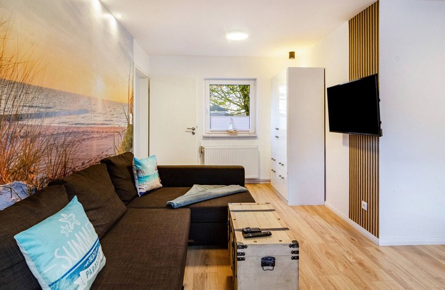 Appartement de vacances 'Wellenrauschen' avec jardin, terrasse, bain à remous et Wi-Fi