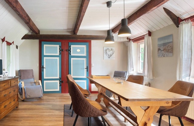 Appartement 'Fewo 2 - Pohns Warft' avec jardin partagé et Wi-Fi