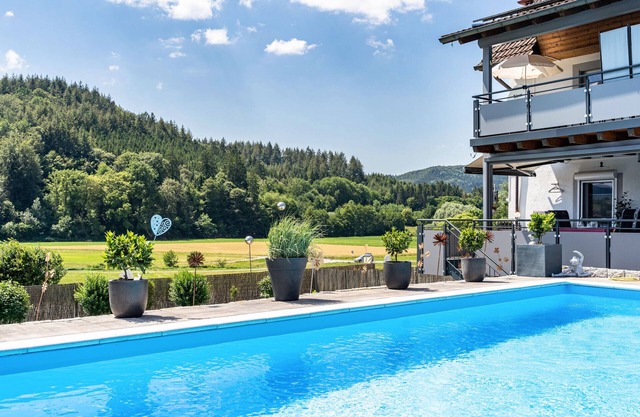 Appartement de vacances "Geisbergblick" avec vue sur les montagnes, piscine partagée et Wi-Fi