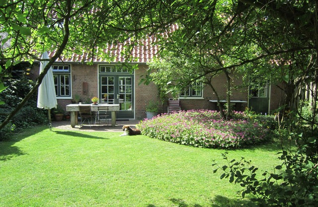 Appartement de vacances dans un grand jardin, proche de la plage et des dunes