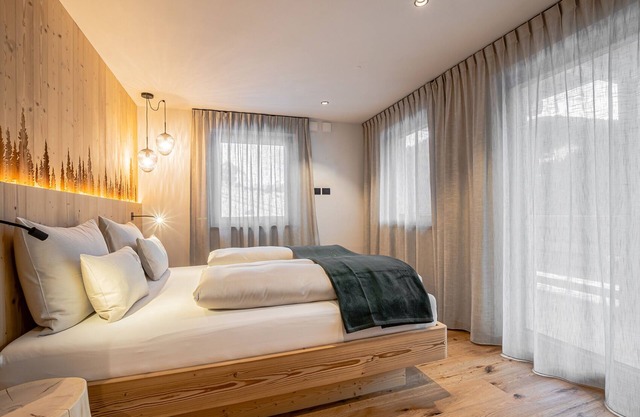 Appartement de vacances "Biohof Ruances Bosch" avec vue sur la montagne, terrasse privée et Wi-Fi