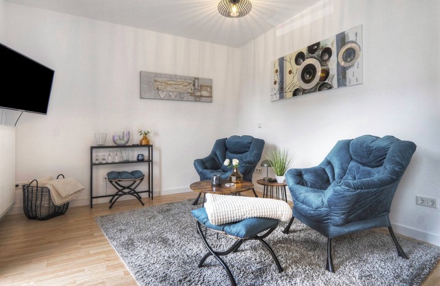 Appartement 'Ferienwohnung Landquartier' avec jardin partagé, balcon et Wi-Fi