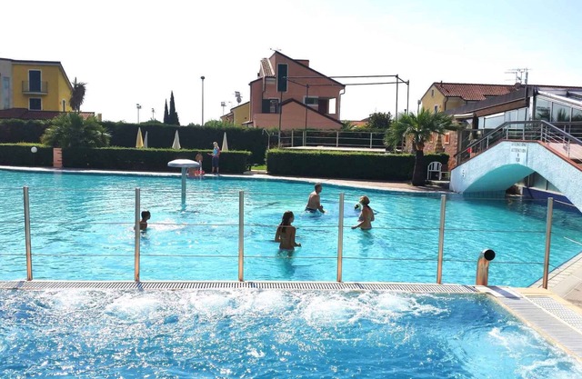 Appartement de vacances avec climatisation et piscine