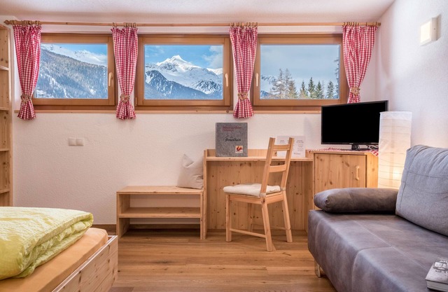 Appartement de vacances "Mountainfarm Innertrein Jöchl" avec vue sur les montagnes, balcon et Wi-Fi.