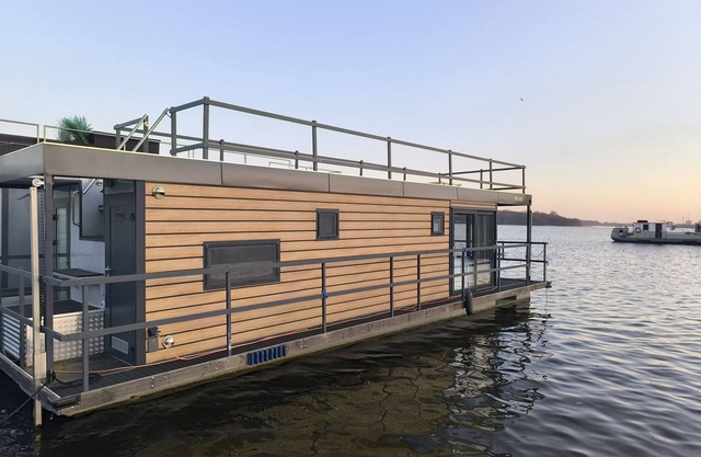 Appartement 'Ferienwohnung Auf Dem See' avec vue sur lac, terrasse partagée et climatisation