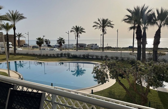 Holiday Apartment "Primera Linea Marina Del Faro" with Sea View, Shared Pool & Wi-Fi