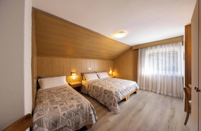 Appartement de vacances Primavera 3 avec vue sur les montagnes, Wi-Fi et jardin