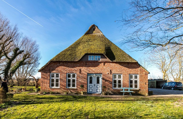 Appartement 'Reetdachhof Familie Dührsen' avec terrasse partagée, jardin partagé et Wi-Fi