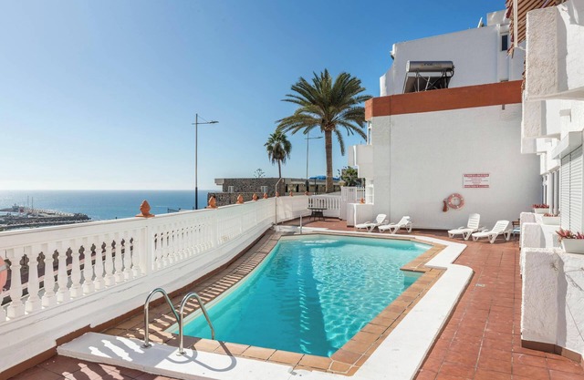 Appartement de vacances 'Sweet Home' avec climatisation, terrasse et piscine partagée