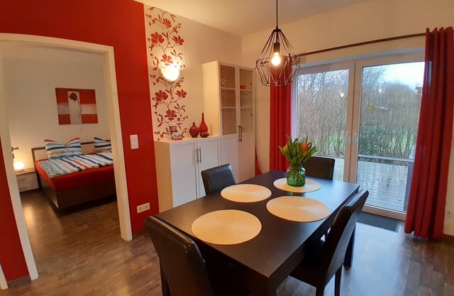 Appartement de vacances "Wikingerland Typ 1 Erdgeschoss" avec terrasse privée, jardin et Wi-Fi