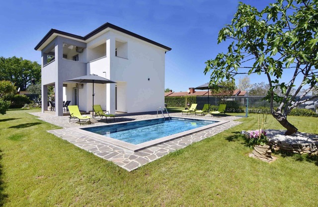 Appartement de vacances avec piscine dans un lotissement calme