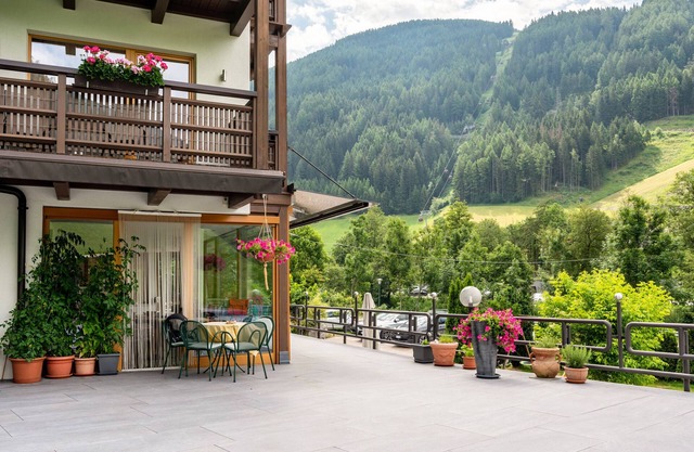 Appartement de vacances 'Zimmerhofer Dolomiti' avec possibilité de wellness à l'hôtel Schwarzenstein
