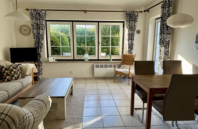 Maison de vacances 'Nordsee Huus' avec terrasse privée, jardin partagé et Wi-Fi