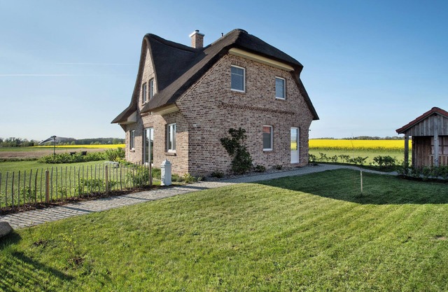 Maison de vacances 'Meerzeit' avec vue sur lac, terrasse privée et Wi-Fi