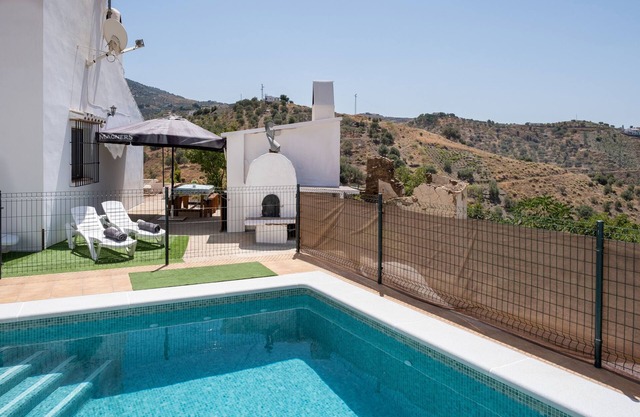 Maison de vacances Casita T avec vue sur les montagnes, piscine et Wi-Fi.