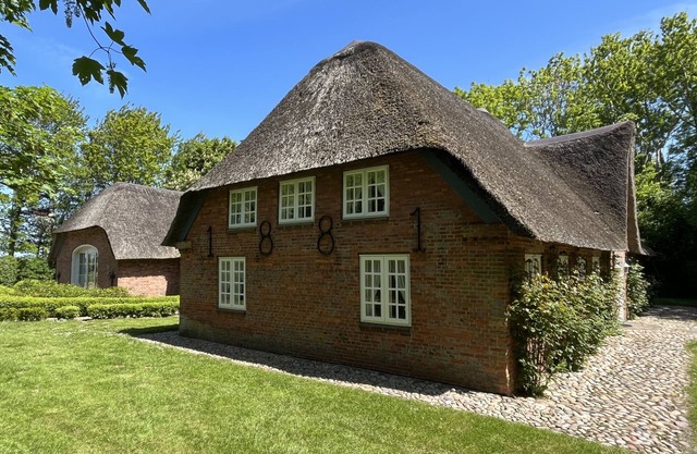 Maison de vacances 'Deichglück Auszeit-Friesenhaus' avec terrasse privée, jardin privé et Wi-Fi