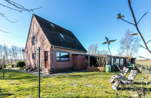 Maison de vacances 'Am Nord-Ostsee-Kanal' avec vue sur lac, terrasse partagée et Wi-Fi