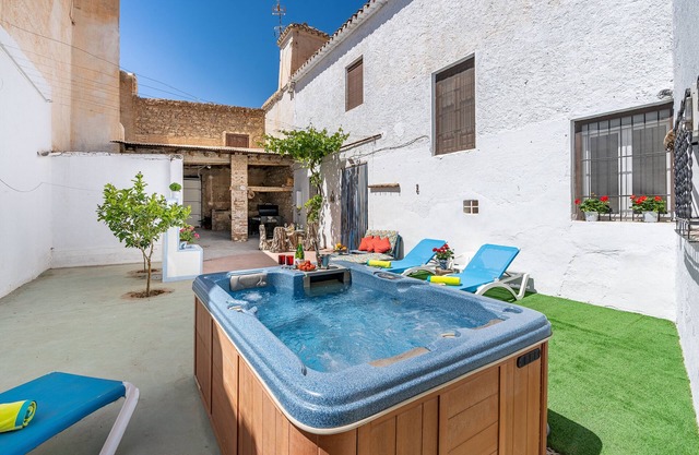 Maison de vacances 'Amelia y Juan de Dios' avec terrasse privée, Wi-Fi et climatisation