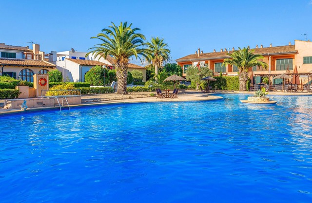 Maison de vacances "Can Om" avec jardin, terrasse, piscine partagée et Wi-Fi