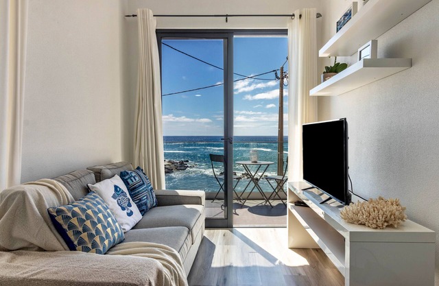 Maison de vacances 'Casa Homem Do Mar' avec vue sur la mer, balcon et Wi-Fi.