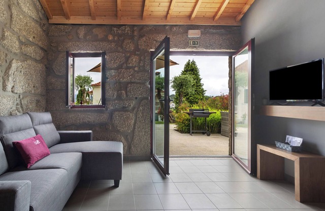 Maison de vacances 'Do Lagar T2' avec vue sur le lac, Wi-Fi et climatisation