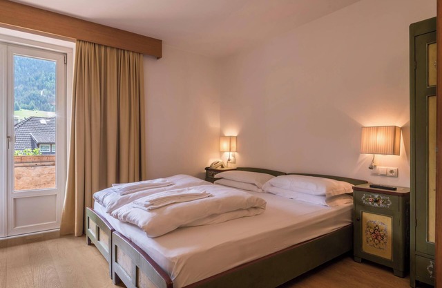Maison de vacances 'Dolomiti Rondula' avec vue sur la montagne, piscine partagée et Wi-Fi