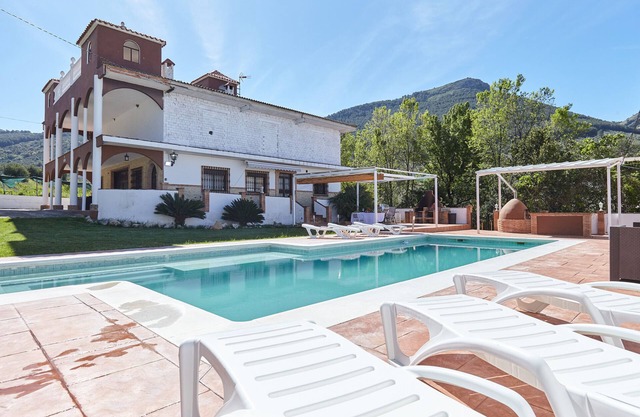 Maison de vacances 'El Ranchito' avec vue sur les montagnes, piscine privée et Wi-Fi