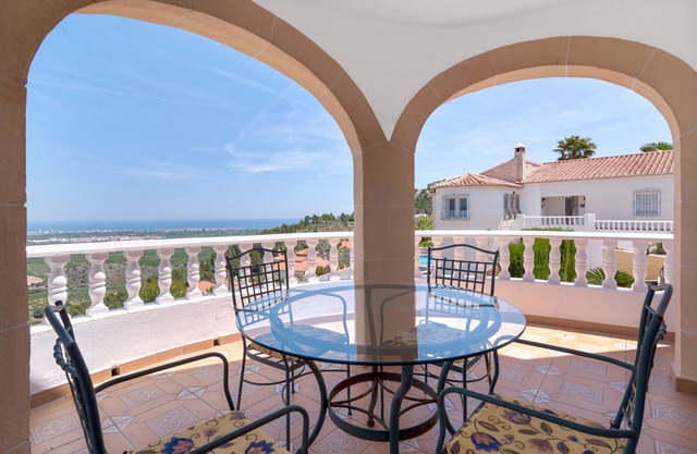 Maison de vacances 'Chalet Tossal Gros' avec vue sur la mer, Wi-Fi et climatisation