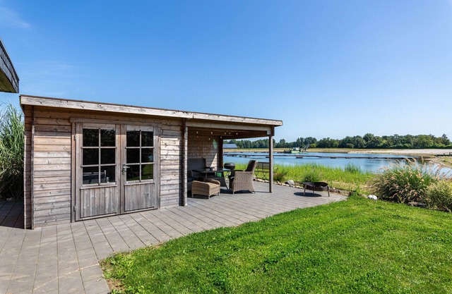 Maison de vacances 'Ferienhaus Am See' avec vue sur lac, terrasse privée et Wi-Fi