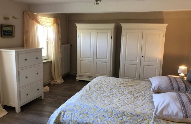 Maison de vacances "Großes Reetdachhaus Langenhorn" avec jardin, terrasse et Wi-Fi