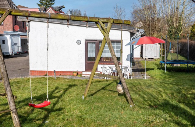 Maison de vacances 'Haus Lahrsen' avec terrasse privée, jardin partagé et Wi-Fi