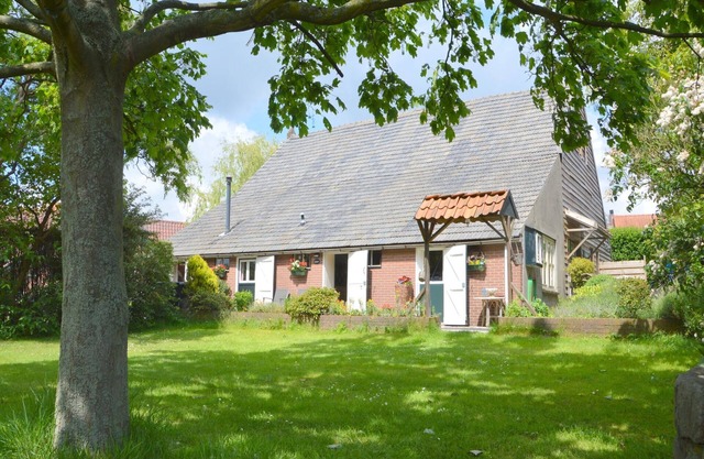 Maison de vacances confortable avec jardin