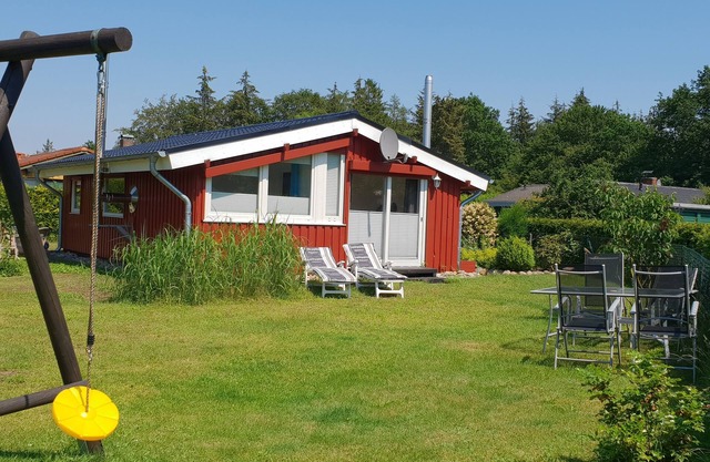 Maison de vacances dans le Schleswig-Holstein entre le nord et la mer Baltique sur une rivière idyllique