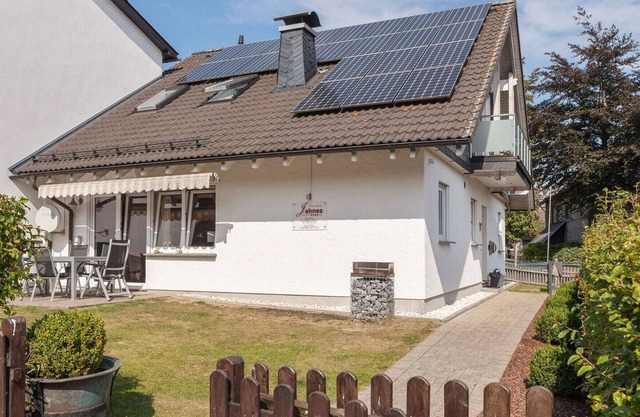 Maison de vacances couverte de neige à Winterberg avec sauna et jardin