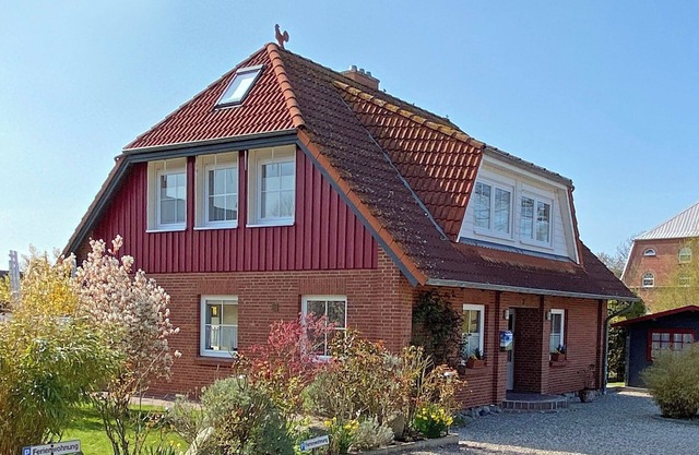 Maison de vacances 'Kleiner Leuchtturm-Backbord' avec terrasse privée, jardin privé et Wi-Fi