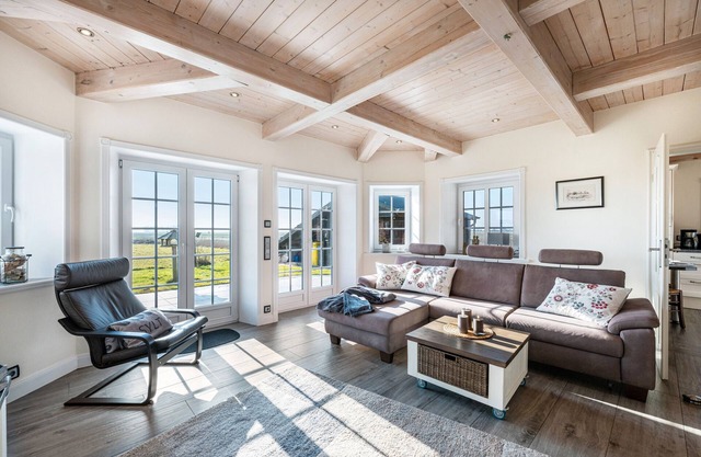 Maison de vacances 'Lüthjes Friesenhaus' avec terrasse privée, jardin partagé et Wi-Fi