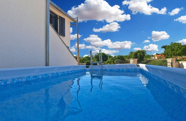 Maison de vacances avec piscine et climatisation