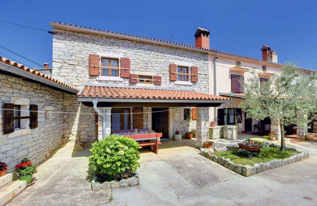 Maison de vacances avec terrasse et climatisation