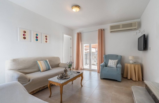 Maison de vacances 'Planta Baja' avec terrasse privée et climatisation