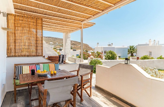 Maison de vacances 'Porto Galini Tinos Triantaros 104' avec terrasse privée, Wi-Fi et climatisation