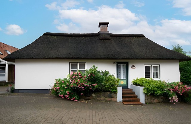 Maison de vacances 'Stine's Hus' avec terrasse privée, jardin privé et Wi-Fi
