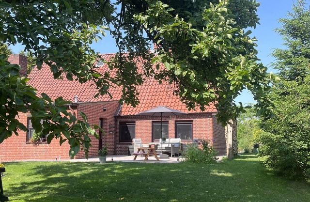 Maison de vacances 'Urlaub An Der Elbmündung' avec terrasse privée, jardin privé et Wi-Fi