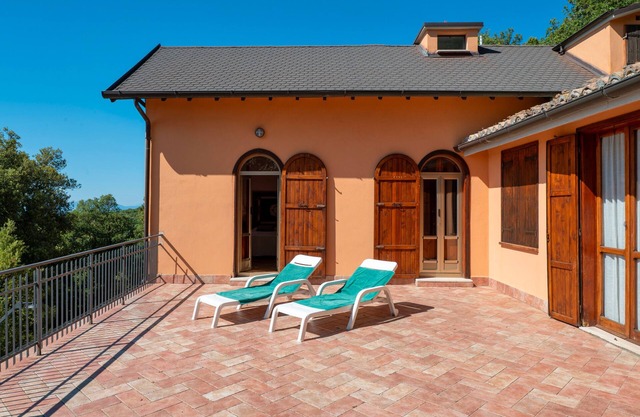 Maison de vacances 'Villa Marta' avec vue sur les montagnes, terrasse et jardin partagé