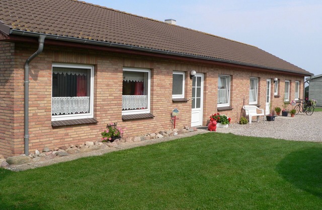 Maison de vacances "Whg 4 - Ferien auf einem Resthof" avec vue sur mer, jardin et Wi-Fi.