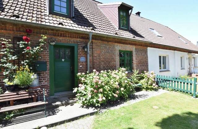 Maison de vacances avec cheminée et terrasse