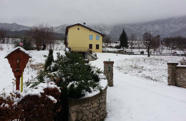 Maison de vacances avec vue sur le jardin et la montagne